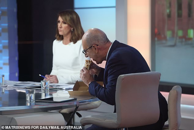 1686274777 David Kochie Koch eats an egg and bacon bun on