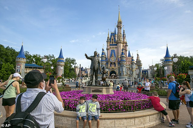 Pictured here are families enjoying a day out at Walt Disney World in Orlando in April