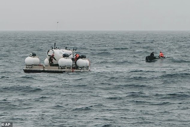 The Titan submarine is shown on Sunday morning, seconds before it sinks around 8am with five people on board