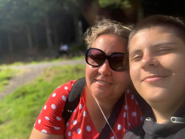 19-year-old Sulaiman Dawood, who went missing aboard the submarine, is pictured with his mother Christine