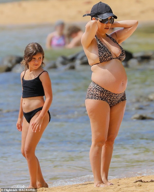 Mom and I: Her kids took part in Kourtney's trip to Hawaii, where little Penelope could be seen scurrying across the sand with her mom