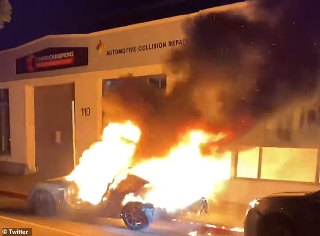 Shocking footage shows a car being set on fire while another vehicle crashes into the car and firecrackers are projected across the streets of Oakland as the excitement mounts