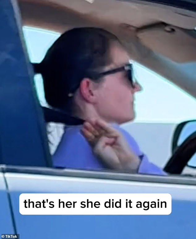 She accelerated so that they pulled alongside the vehicle in question when suddenly a woman put her fingers to the window and opened and closed them into a fist