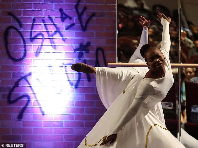 Onederful Ancrum, a dancer from Philadanco, performs during the celebration of life ceremony to honor the shock death of her friend