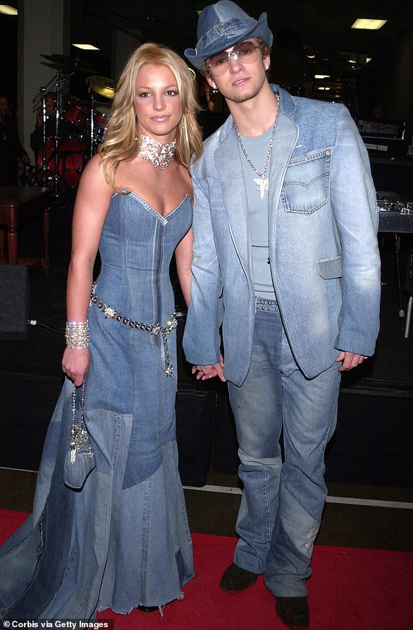 Great love: Britney's first serious relationship was with her former Mickey Mouse Club co-star Justin Timberlake.  He wrote a public apology last year after fans were outraged at how the split was portrayed in several documentaries (pictured in 2001).