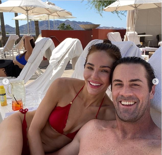 In other photos, the new couple sat by the pool and posed for a few selfies