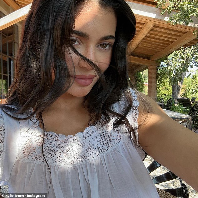 Natural: Instead of her trademark glamorous look, Kylie looked fresh with minimal makeup in selfies taken outdoors