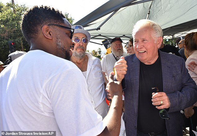 Sheen shared a laugh with Hill and Schiff as the cast reunited at the event