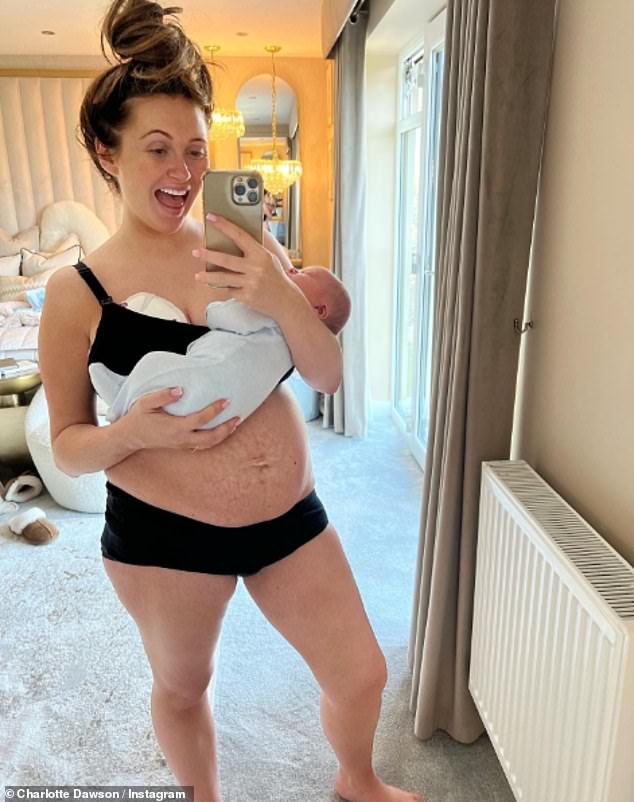 Charlotte Dawson proudly flaunts her postpartum figure as she embraces