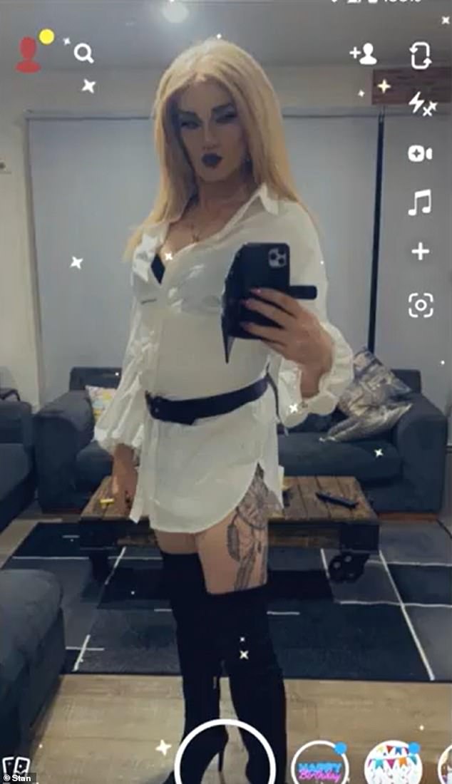 In never-before-seen pictures, the former North Melbourne coach wears a white t-shirt dress and black thigh-high boots - and shows off her dreamcatcher thigh tattoo