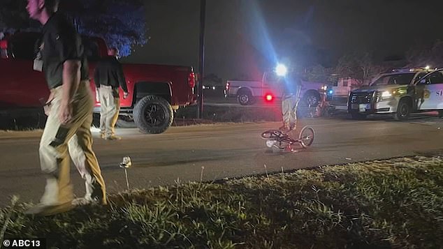 Benjamin's bike lies on the road outside his home hours after the accident on Monday evening that led to his tragic death