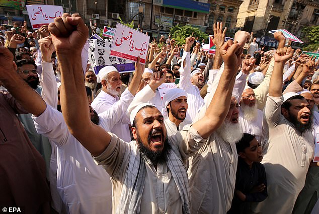 Supporters of the conservative Muttahida Shariat Mahaz Pakistan party during a solidarity demonstration with the Palestinian people in Peshawar, Pakistan