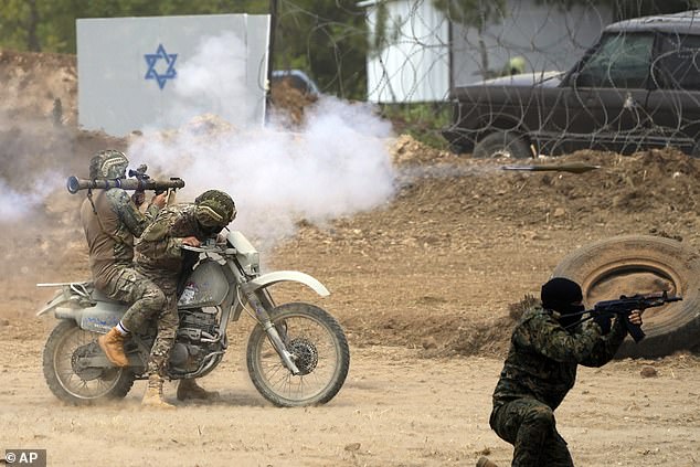 Hezbollah fighters, pictured during a training exercise in May, have long trained for war against Israel