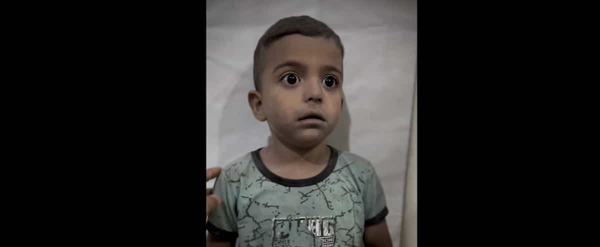 1697762680 Gaza Traumatized boy comforted by doctor