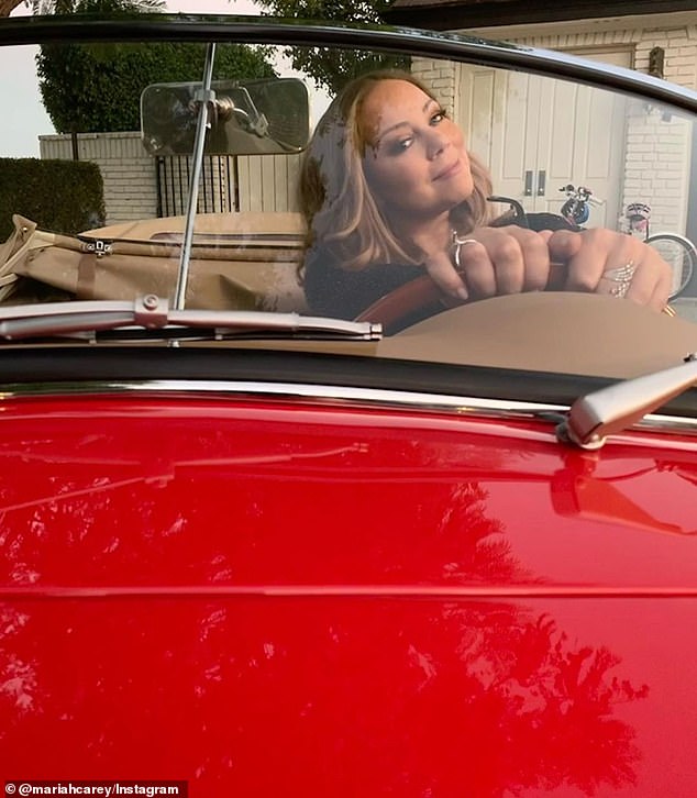 Tribute: The Grammy-winning superstar beamed behind the wheel as she shared a series of photos showing the stunning restoration of her father's red runabout