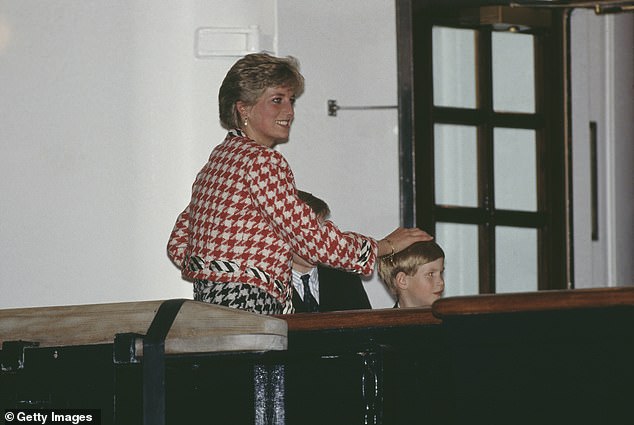 Prince William and Prince Harry greet their mother Diana on the deck of the royal yacht Britannia in Toronto, Canada in October 1991