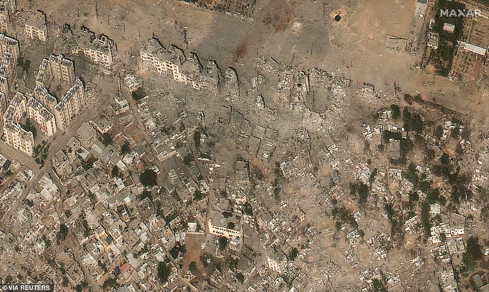 After the Israeli bombing, this neighborhood has turned into a dusty wasteland with dilapidated buildings and rubble scattered everywhere