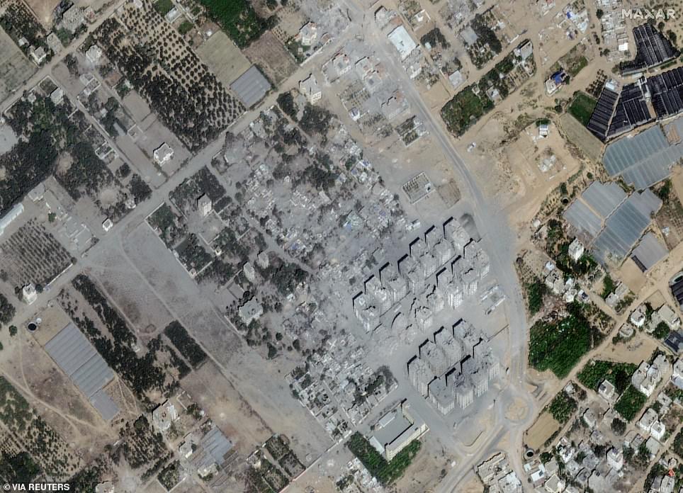 After Israeli airstrikes, much of this Atatra district is covered in gunmetal gray ash