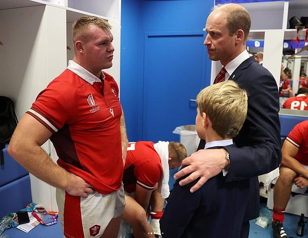 The image of Prince William with his arm around Prince