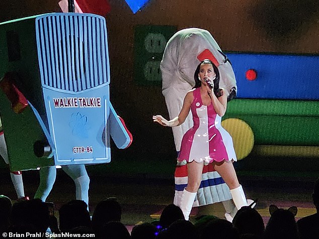 Theatrical: As she changed into a bubblegum pink and white mini dress, Katy appeared shocked by the appearance of a ghost on stage