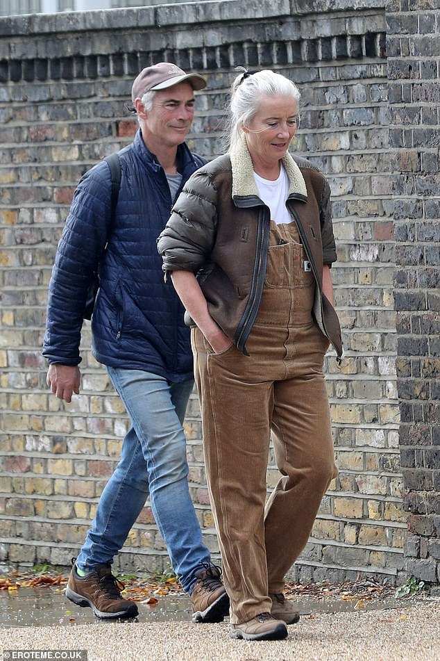 Chic: The actress looked stylish in a pair of casual brown dungarees with a white t-shirt underneath