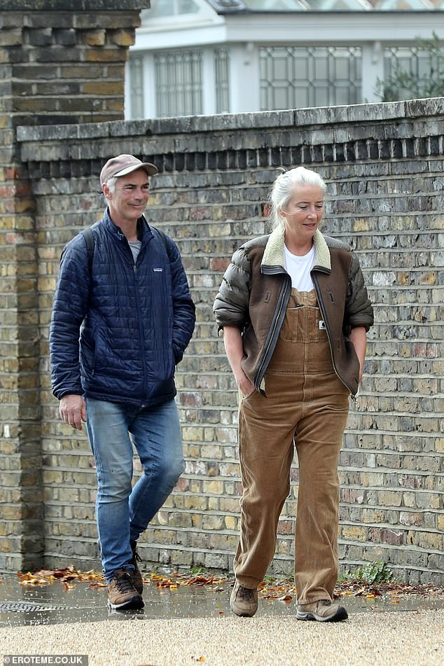 Casual: To stay warm, she completed her look with a brown sherpa jacket and practical hiking boots