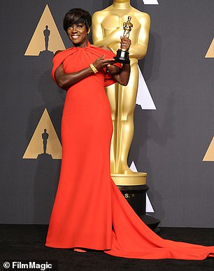 Davis holds her 2017 Oscar for Best Supporting Actress