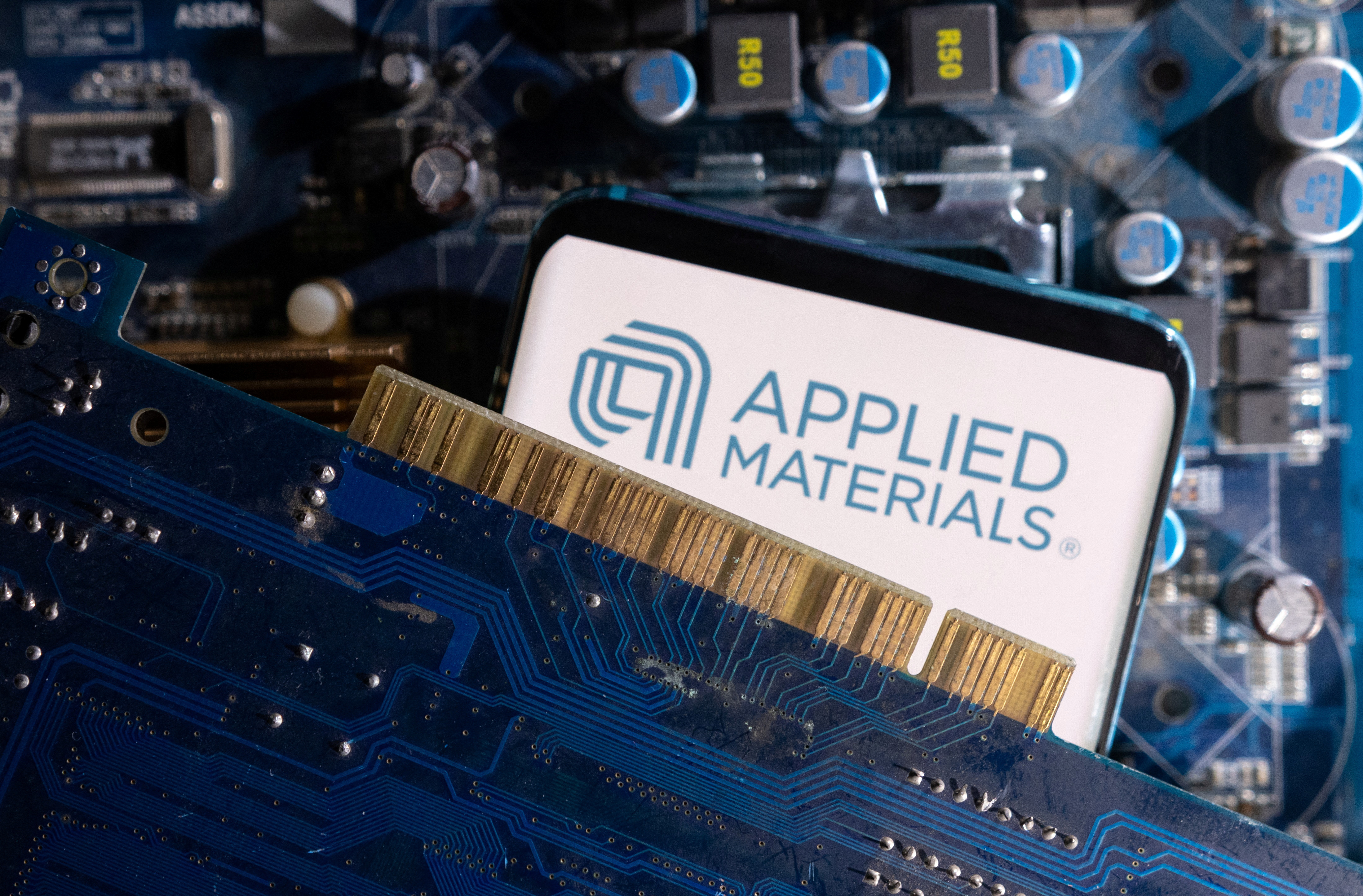 The image shows the Applied Materials logo