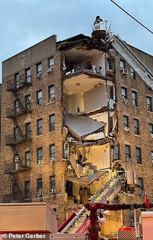 The bare walls of several residential units were exposed to the street below