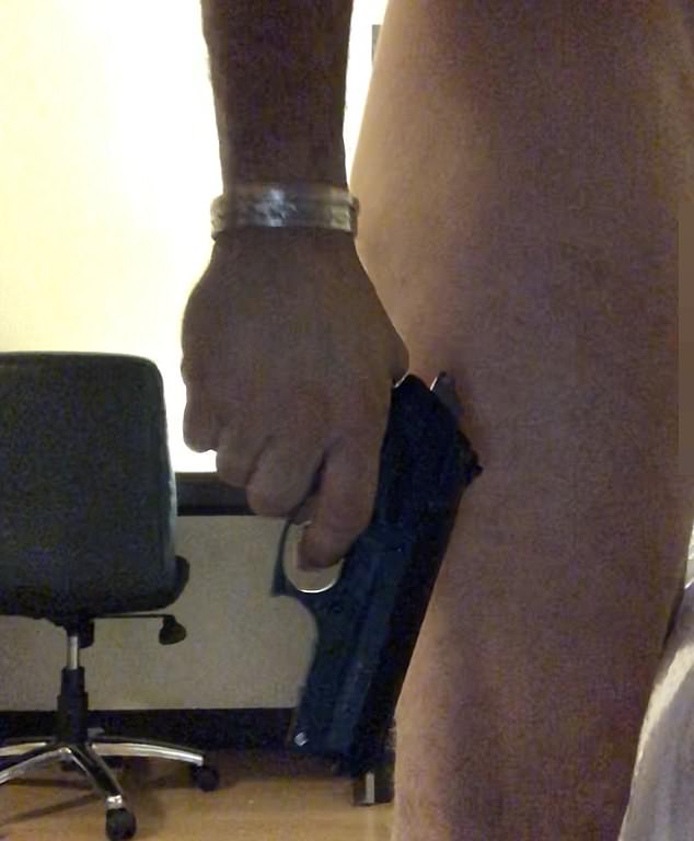 An image from Hunter Biden's laptop showed the now 53-year-old first son posing naked with a gun