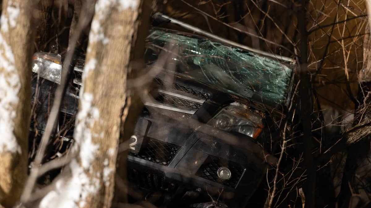 Car hanging over a cape rescue of a driver stuck