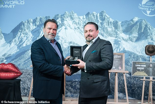 The watch, a rare Audemars Piguet, was won by Arnold's long-time friend Klemens Hallman, 48, who paid $293,000 for it.  The proceeds went to the Schwarzenegger Climate Initiative