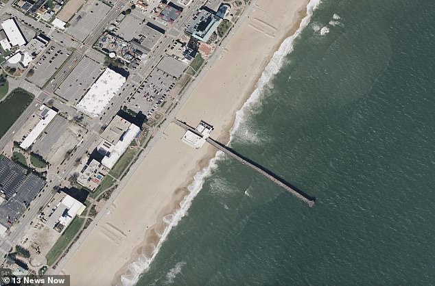 The pier is 650 feet long and the water at the end is about 15 feet deep.  The water temperatures are around 40°C