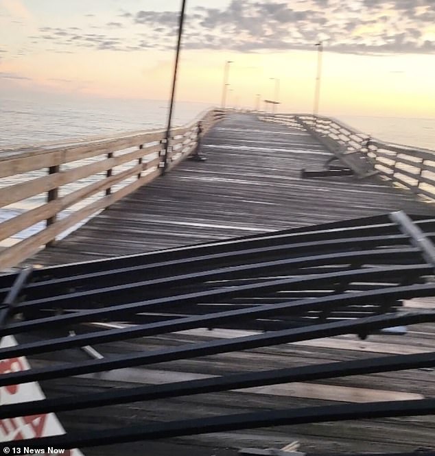 The car broke through two barriers and reached the end of the pier