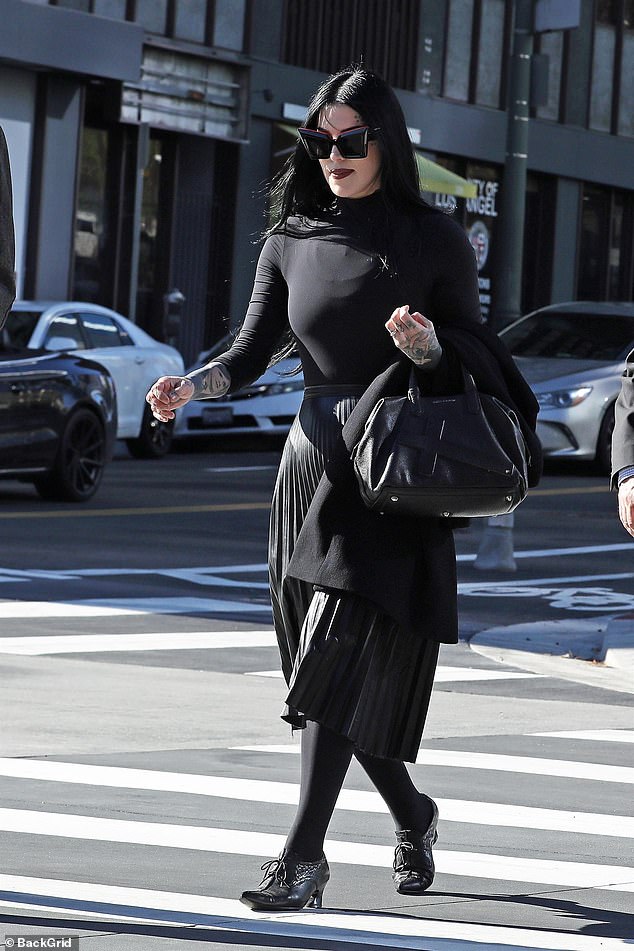 Kat Von D was seen giddy as she left a