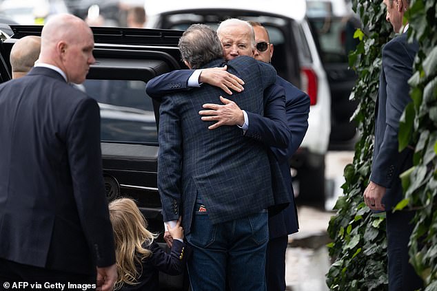 Beau watches President Biden hug Hunter