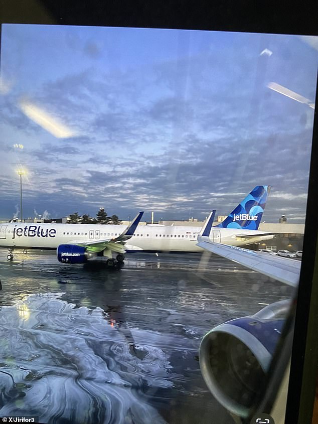 A view of the damaged JetBlue wing from another aircraft