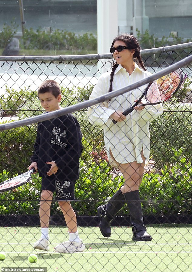 The 44-year-old media personality was spotted playing tennis and petting horses with her children Penelope, 11, and son Reign, 9, on Wednesday