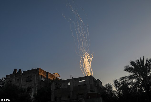 A view shows rockets being fired from the Gaza Strip coast towards Israel during the Israeli military operation in Khan Younis
