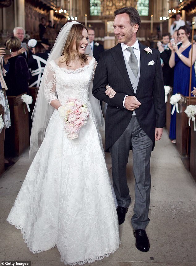 The couple is pictured on their wedding day in Woburn on May 15, 2015