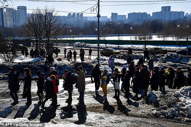 Thousands still take to the streets of Moscow to pay their respects to the dead dissident