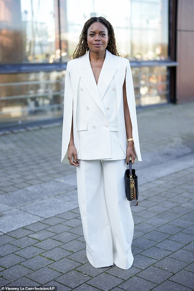 Actress Naomie Harris, 47, looked dapper in a white blazer and flared trousers as she arrived