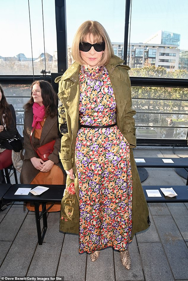 Anna Wintour opted for a floral look paired with a green coat