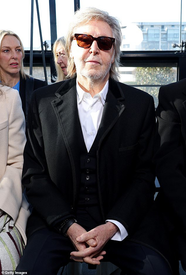 Stella's famous dad Paul McCartney was also at FROW to support her, looking cool in a black suit and white shirt