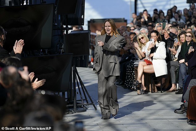 She appeared to be in great spirits as she walked the runway after the presentation